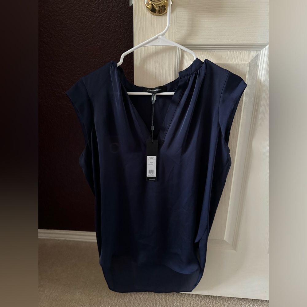 BCBGMAXAZRIA NWT ( new with tags) navy sleeveless top. 100% polyester